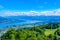 Panoramic view of Zurich lake and Alps from the top of Uetliberg mountain, from the observation platform on tower on Mt. Uetliberg