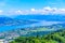 Panoramic view of Zurich lake and Alps from the top of Uetliberg mountain, from the observation platform on tower on Mt. Uetliberg