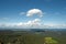Panoramic views of the Black Forest with clouds and pine.