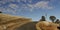 panoramic views of dry grassy drought stricken farm