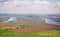 Panoramic views of the natural landscape: the river, the fields, the city