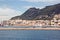 Panoramic views of the port and the city of Gibraltar during day and night. Kind of carg o and merchant vessels anchored..