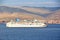 Panoramic views of the port and the city of Gibraltar during day and night. Kind of carg o and merchant vessels anchored.