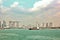 Panoramic views of the port and the city of Singapore during day and night. Kind of cargo and merchant vessels anchored.