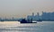 Panoramic views of the port and the city of Singapore during day and night. Kind of cargo and merchant vessels anchored.