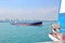 Panoramic views of the port and the city of Singapore during day and night. Kind of cargo and merchant vessels anchored.