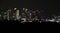 Panoramic views of the port and the city of Singapore during day and night. Kind of cargo and merchant vessels anchored.