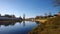 Panoramic views of the river Tikhvinka and the walls of the monastery