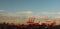 panoramic views of tall port shipping cranes standing tall loading a ship in port with shipping containers at Port Melbourne, with