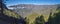 Panoramic volcanic landscape and lush pine tree forest, pinus canariensis view from Mirador de la Cumbrecita at national