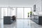 Panoramic white, grey kitchen interior with orange bar stools