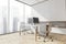 Panoramic white office area with stylish workplace