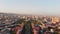 Panoramic wide Yerevan city center aerial backwards view from cascade complex on sunrise in summer