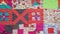 Panoraming of surface of stitched crumpled patchwork scarf