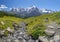 The panorma of Bernese alps with the Jungfrau, Monch and Eiger peaks with the little creek