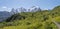 The panorma of Bernese Alps with the Jungfrau, Monch and Eiger peaks over the alpinemeadows