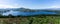 Panroama landscape of colorful summer heath with a view of Caragh Lake and the mountains of the Dingle Peninusla in County Kerry