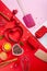 Pans hearts mold, whisk, eggs, wooden spatula and grated chocolate. Ingredients to making festive cake. Valentines Day bakeware