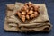 Pansib pastry stuffed on burlap fabric background, Thai style dumplings stuffed, thai dessert, kind of snack