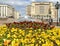 Pansy flowers on background of fountain Domes at Manege Square. Moscow