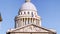 Pantheon building in Paris, France with focus on French flag