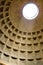 Pantheon Dome in Rome, Italy as the light shines through the oculus a central opening in the roof.