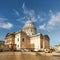 Pantheon in Paris on a bright day with blue sky and feather clouds