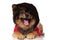 Panting pomeranian with red jacket and hoodie on head lying