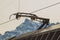 Pantoghraph, the device to pick up current from overhead lines on swiss railways. Visible mountains in switzerland in the