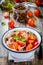 Panzanella: Italian salad with tomatoes, ciabatta, olives, red onion and basil