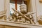 Papal regalia and insignia on the building at St. Peter square,