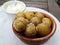 Papas pattatas arrugadas. Spanish tapas with salted potatoes and white aioli sauce