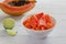 Papaya fruit with chili, mexican snack, spicy food in mexico