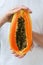 Papaya, tropic fruit, slice, peace, half, hands