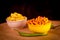 papdi and tikha gathiya with fresh green chilli on wooden teble,Indian Namkeen or snacks in white bowl on wooden background, close