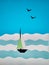 Paper application of a sailboat on the sea and seagulls