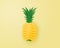 Paper art and craft made Sliced pineapple on yellow background