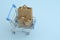 Paper bag in a trolley. Fast and free shipping. Online shopping and express delivery. Quarantine