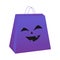 Paper bags for Halloween shopping. Purple pack with funny mug isolate