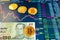 Paper bill Vietnam 20 VND, blurred background. The electronic schedule of bitcoin on the exchange, volume trades, on the