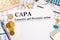 Paper with CAPA- Corrective and Preventive action on the table