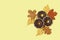 Paper chocolate donuts and autumn leaves