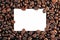 Paper on coffee bean background concept copy space