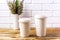 Paper coffee cups mockup with cord wild grass