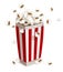 Paper cup full of popcorn