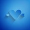 Paper cut Amour symbol with heart and arrow icon isolated on blue background. Love sign. Valentines symbol. Paper art