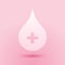 Paper cut Blood drop icon isolated on pink background. Donate drop blood with cross sign. Donor concept. Paper art style