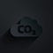 Paper cut CO2 emissions in cloud icon isolated on black background. Carbon dioxide formula, smog pollution concept