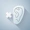Paper cut Deafness icon isolated on grey background. Deaf symbol. Hearing impairment. Paper art style. Vector