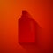 Paper cut Fabric softener icon isolated on red background. Liquid laundry detergent, conditioner, cleaning agent, bleach